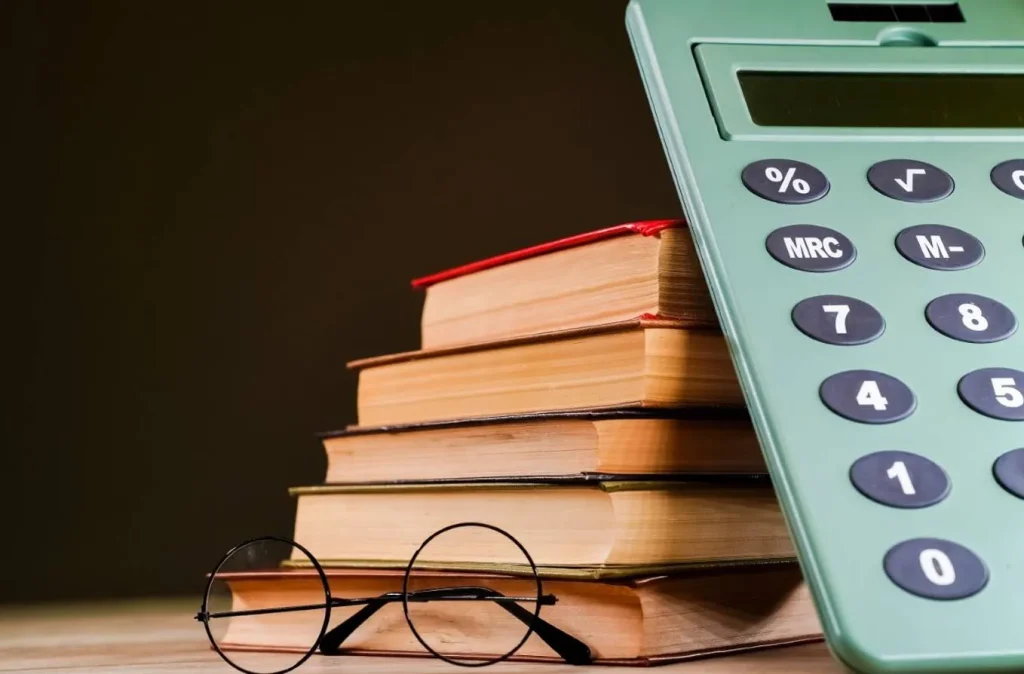 Books and calculator stack