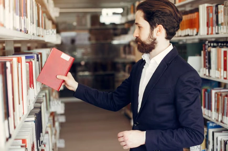 Business leader reading a leadership book
